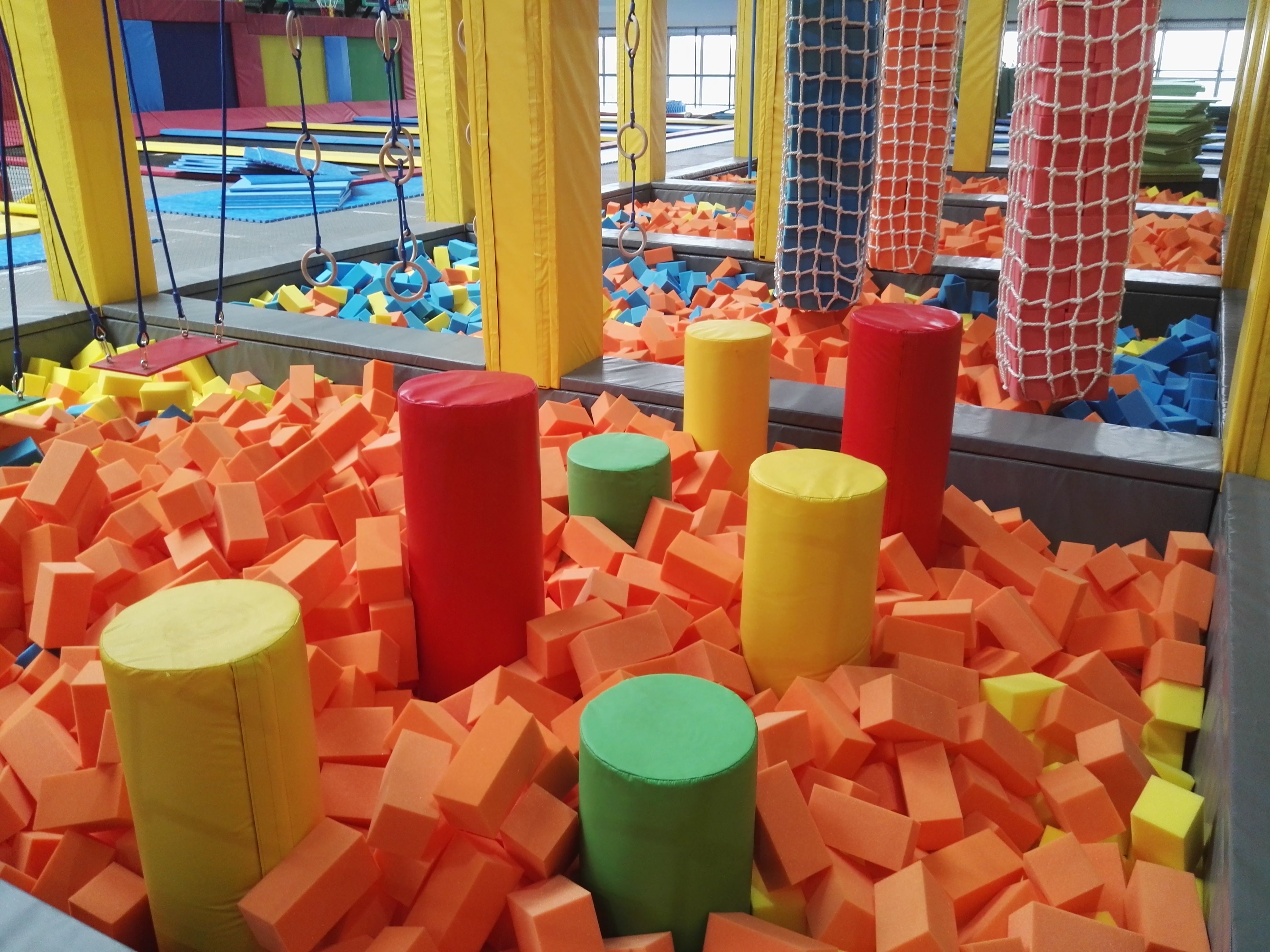 What is soft play area in an indoor playground?