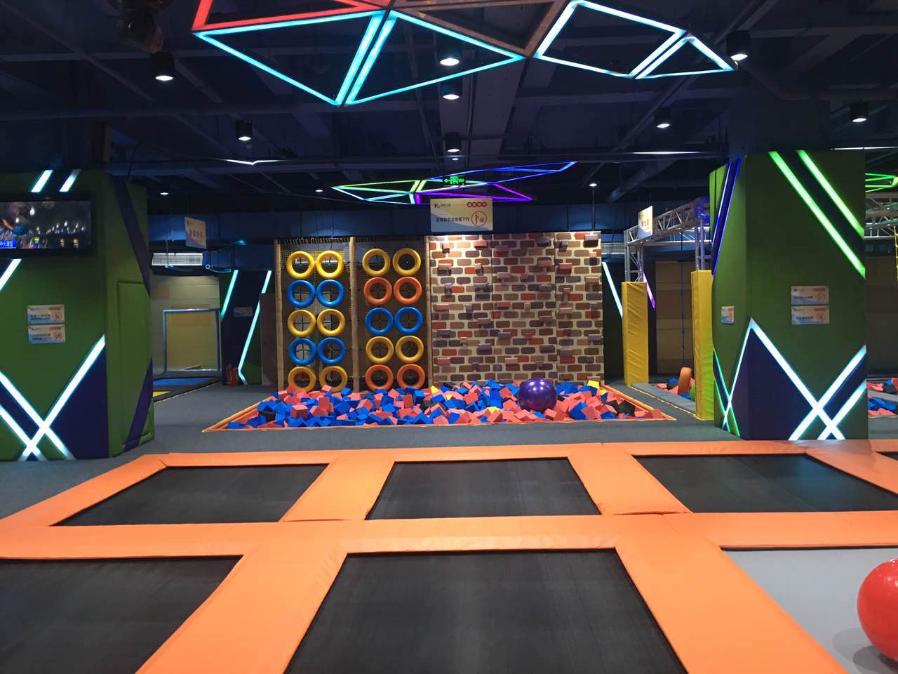 trampoline park foam pit with climbing wall