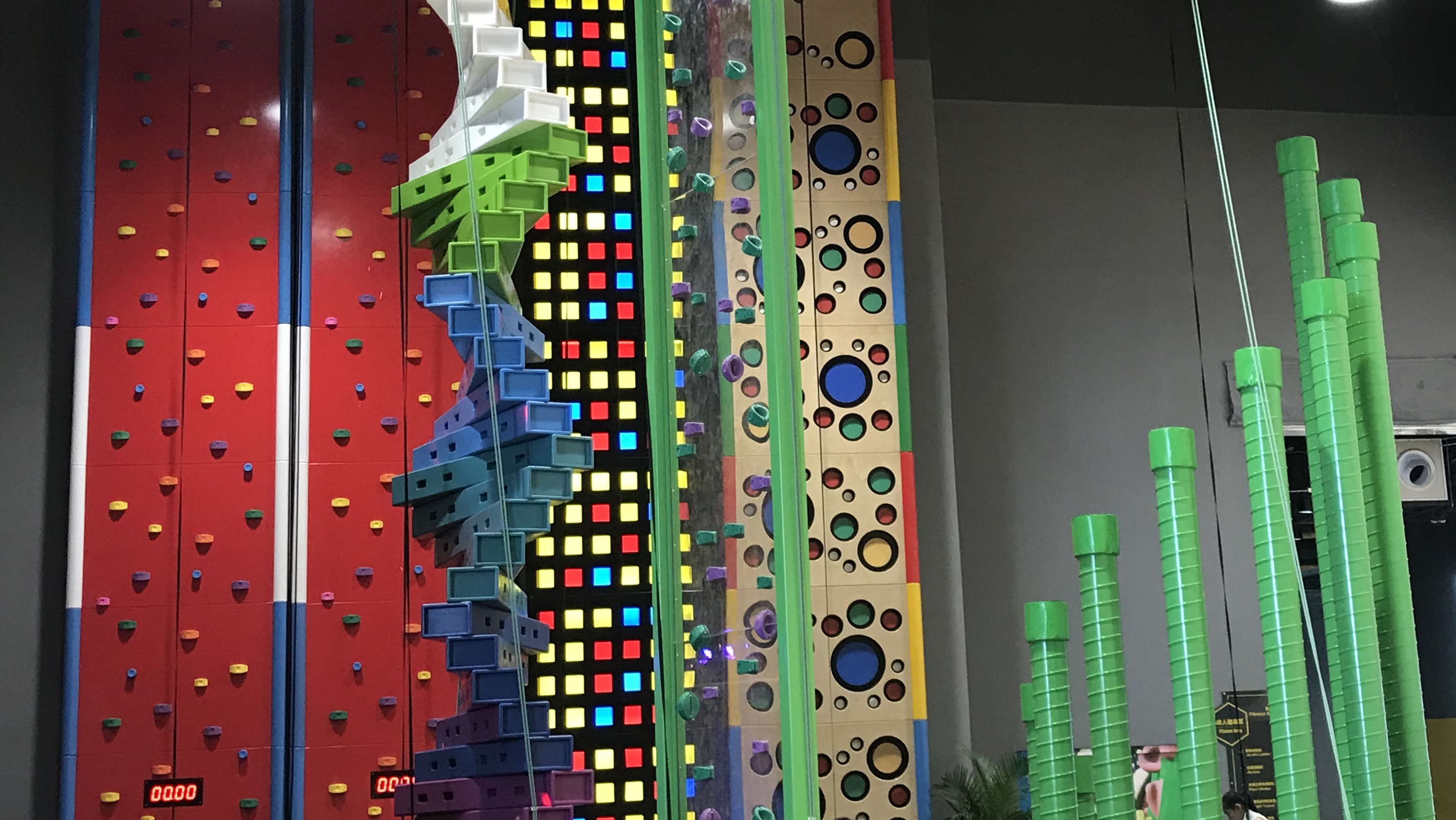 Who invented rock climbing wall?
