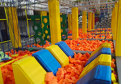 What is the adventure area like in an indoor playground?